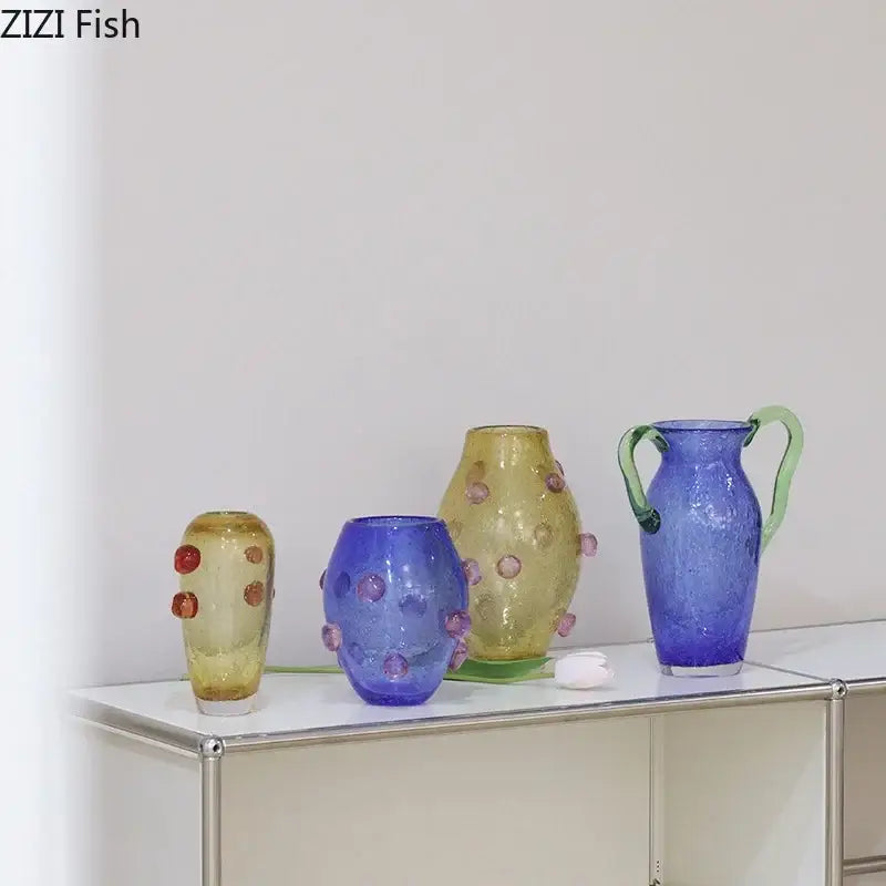 A vibrant blue creative bubble glass pitcher with green handles and textured bubbly surface for decorbites creative bubble decor