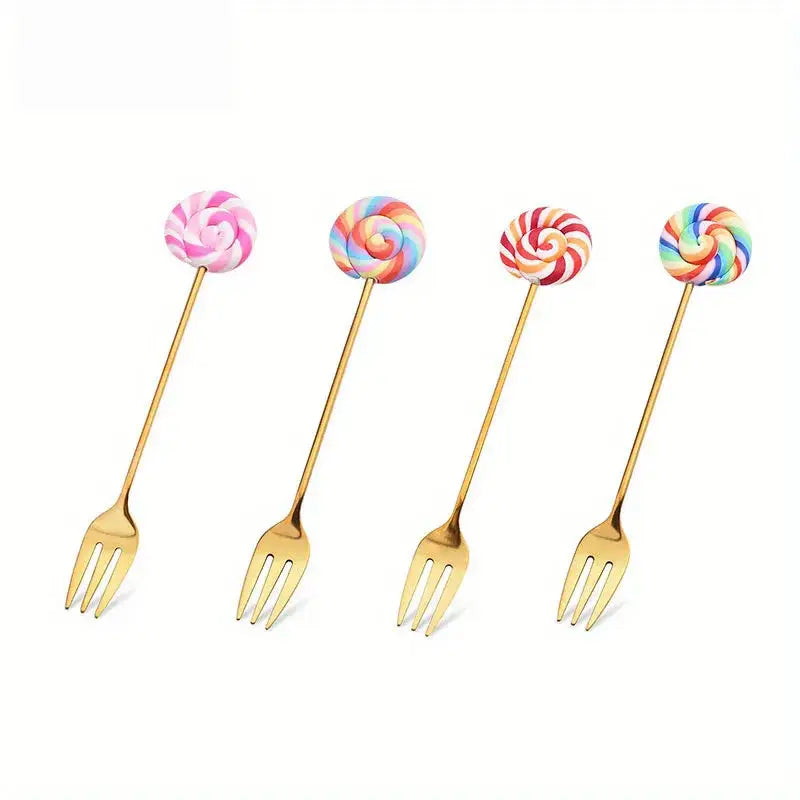 Four gold-colored candy donut dessert forks with colorful swirled lollipop handles in pink, rainbow, red-white, and multicolor patterns