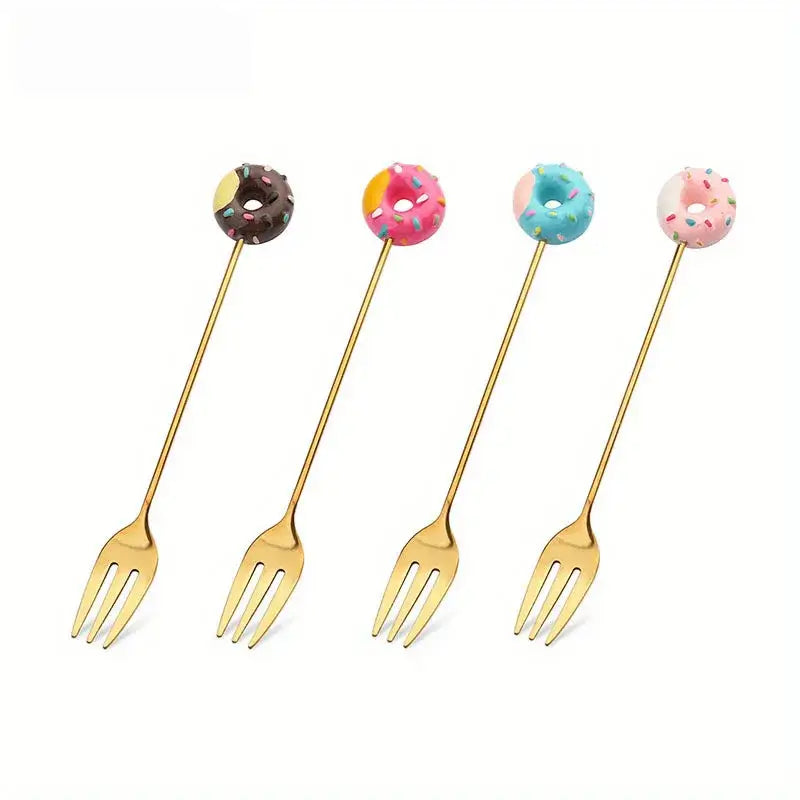 Set of four gold-colored candy donut dessert forks with colorful sprinkled handles for creative dining room use