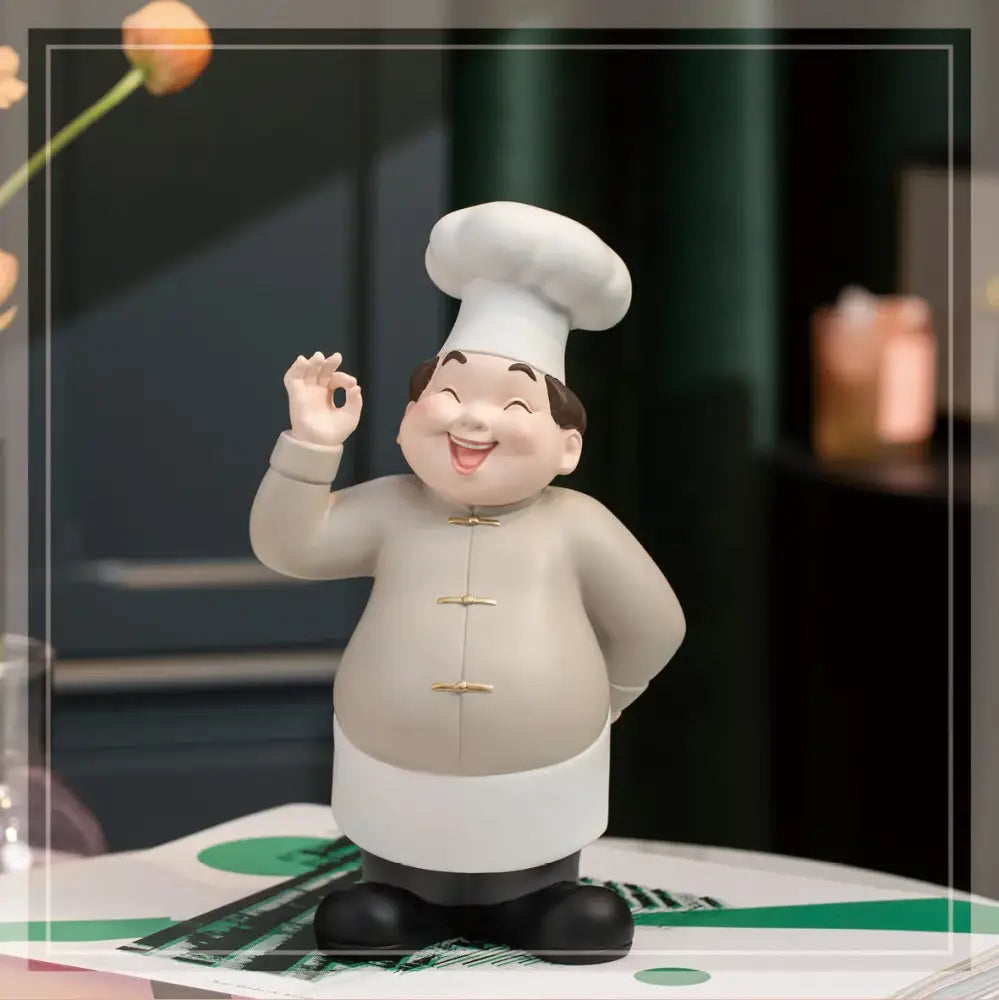 A cheerful chubby chef figurine with white toque and beige coat gold buttons creative chef wine rack sculpture decor
