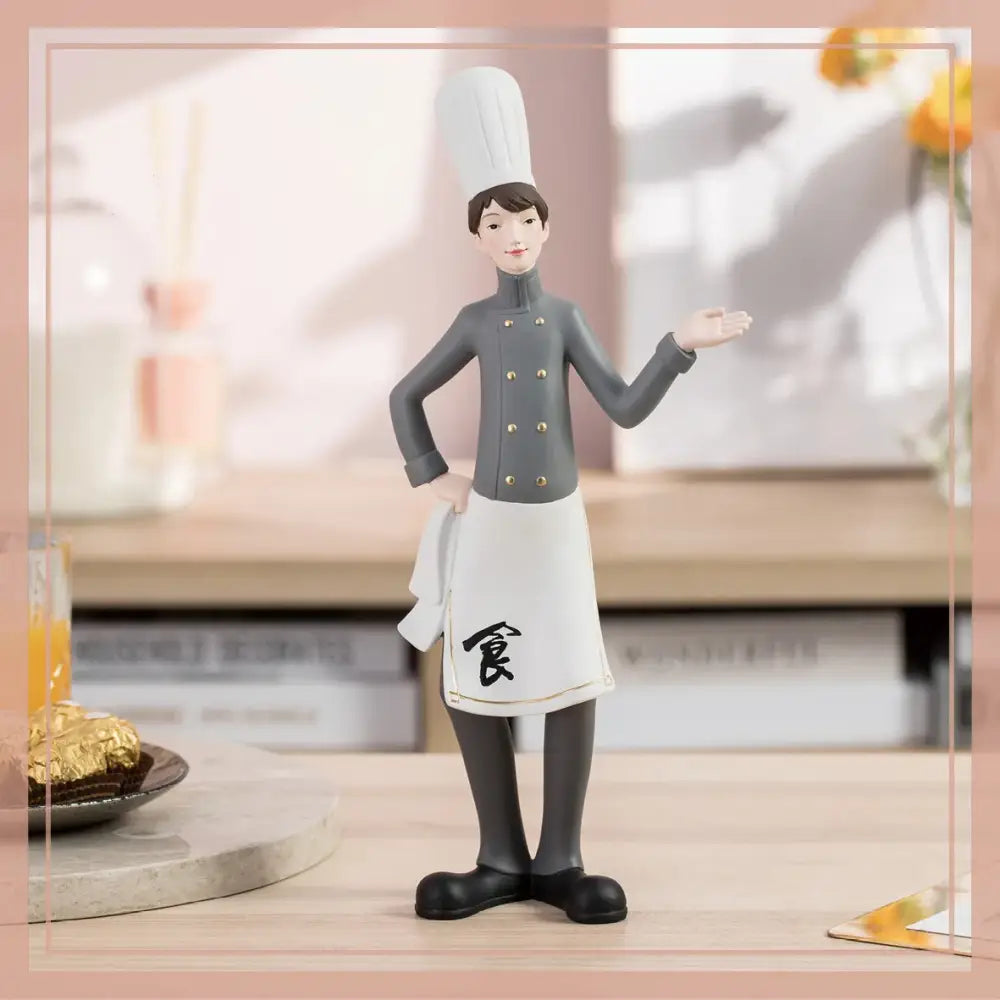 Gray chef figurine with white tall hat and gold buttons on jacket as creative chef wine rack sculpture decor