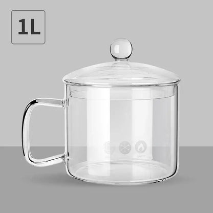 Clear glass salad bowl with handle and matching lid featuring three etched icons for kitchen and dining room use