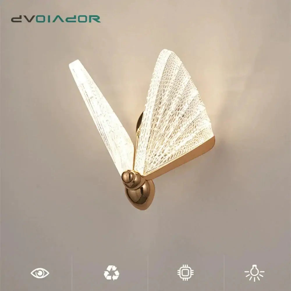 Gold-toned creative colorful butterfly led wall lamp with translucent textured woven glass wings emitting soft glow