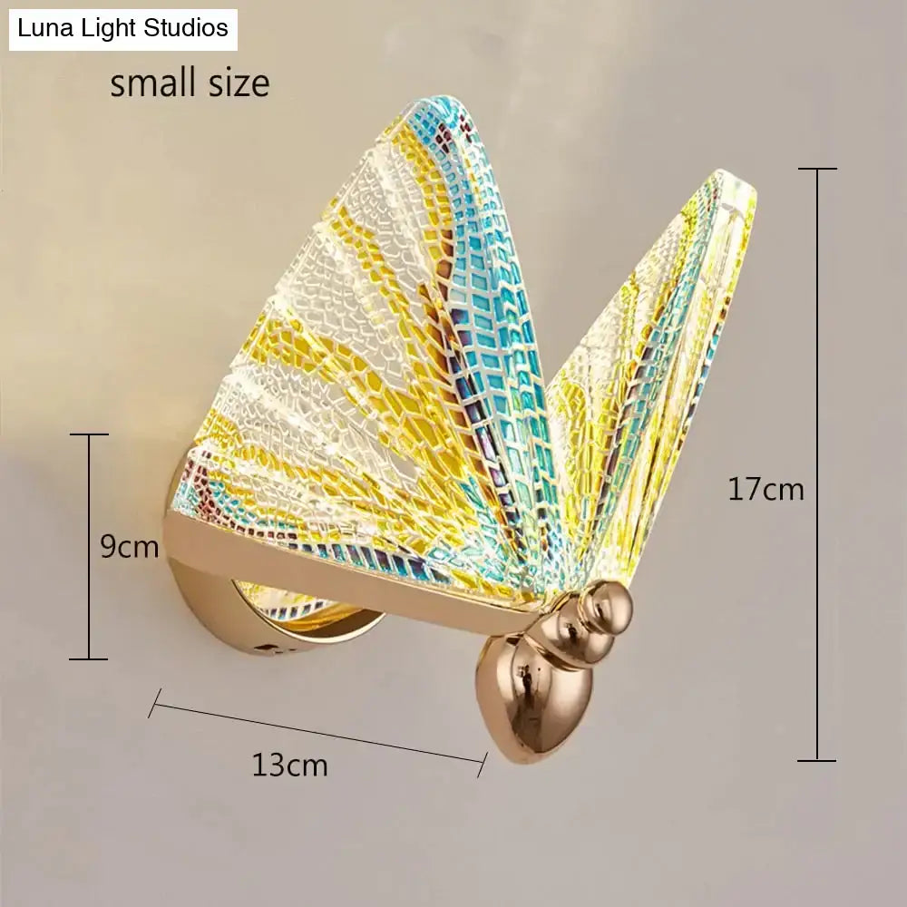 Creative colorful butterfly led wall lamp with mosaic blue yellow white wings and gold-toned metallic body for bedroom