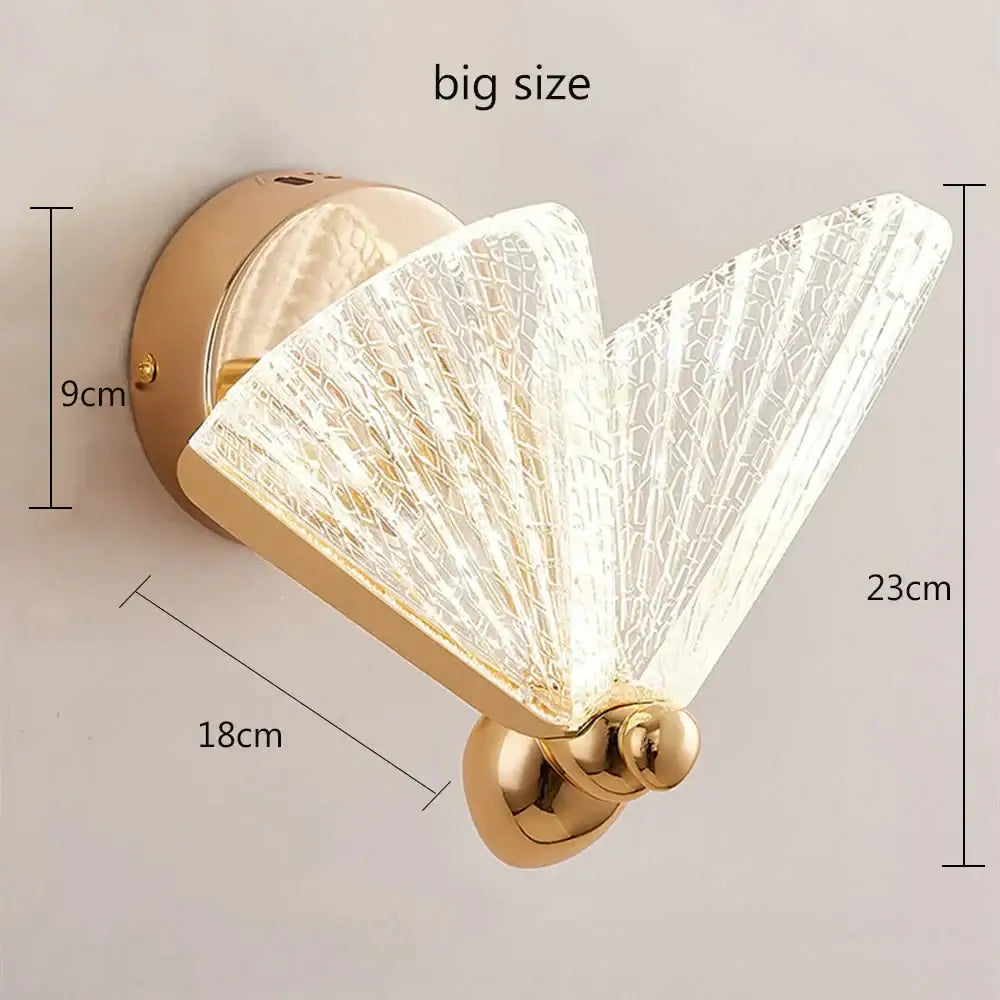 Gold-finished nordic creative colorful butterfly led wall sconce with translucent textured glass fan-shaped shade for bedroom