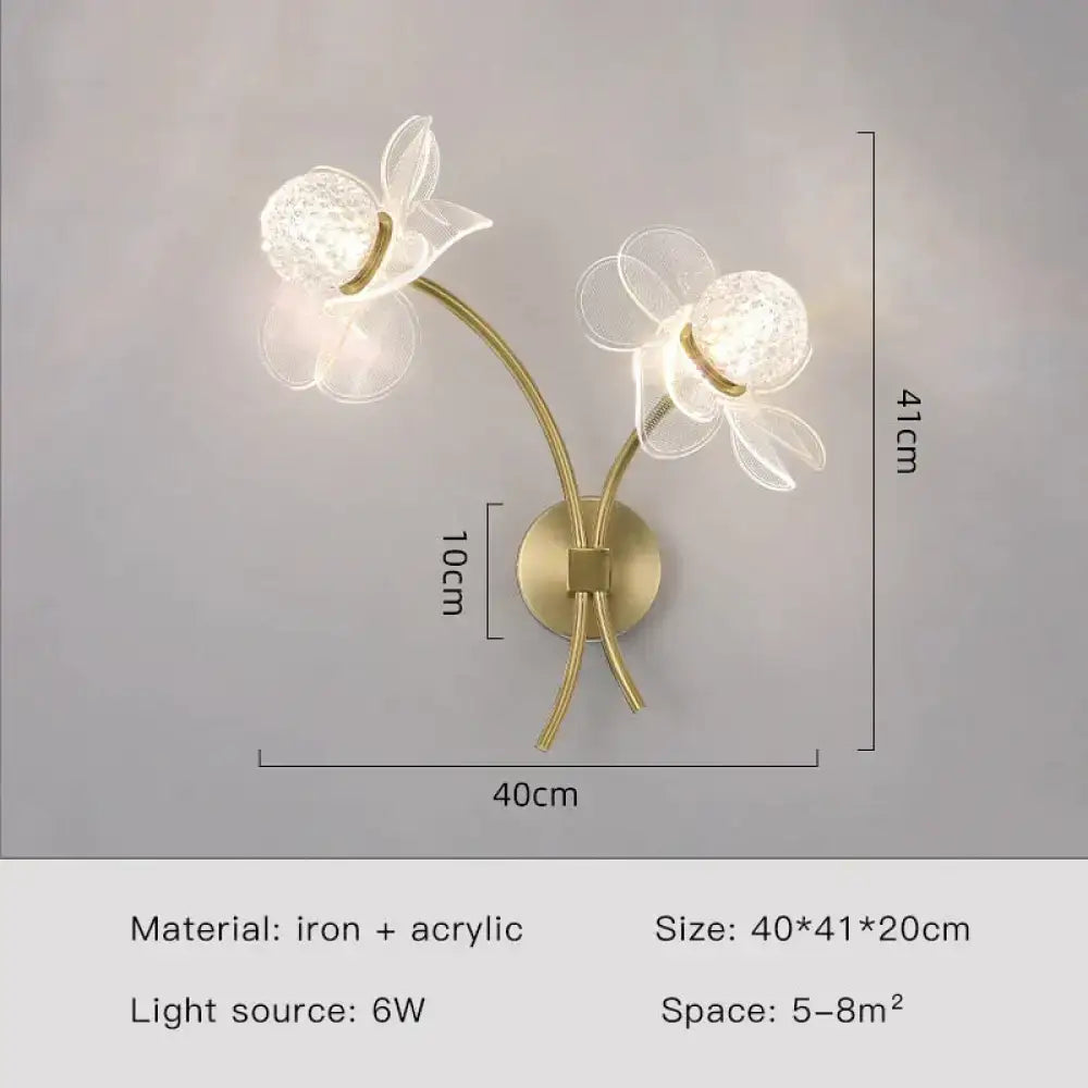 Creative floral decorative gold led wall lamp with translucent acrylic flower fixtures and textured glass globes for bedroom use