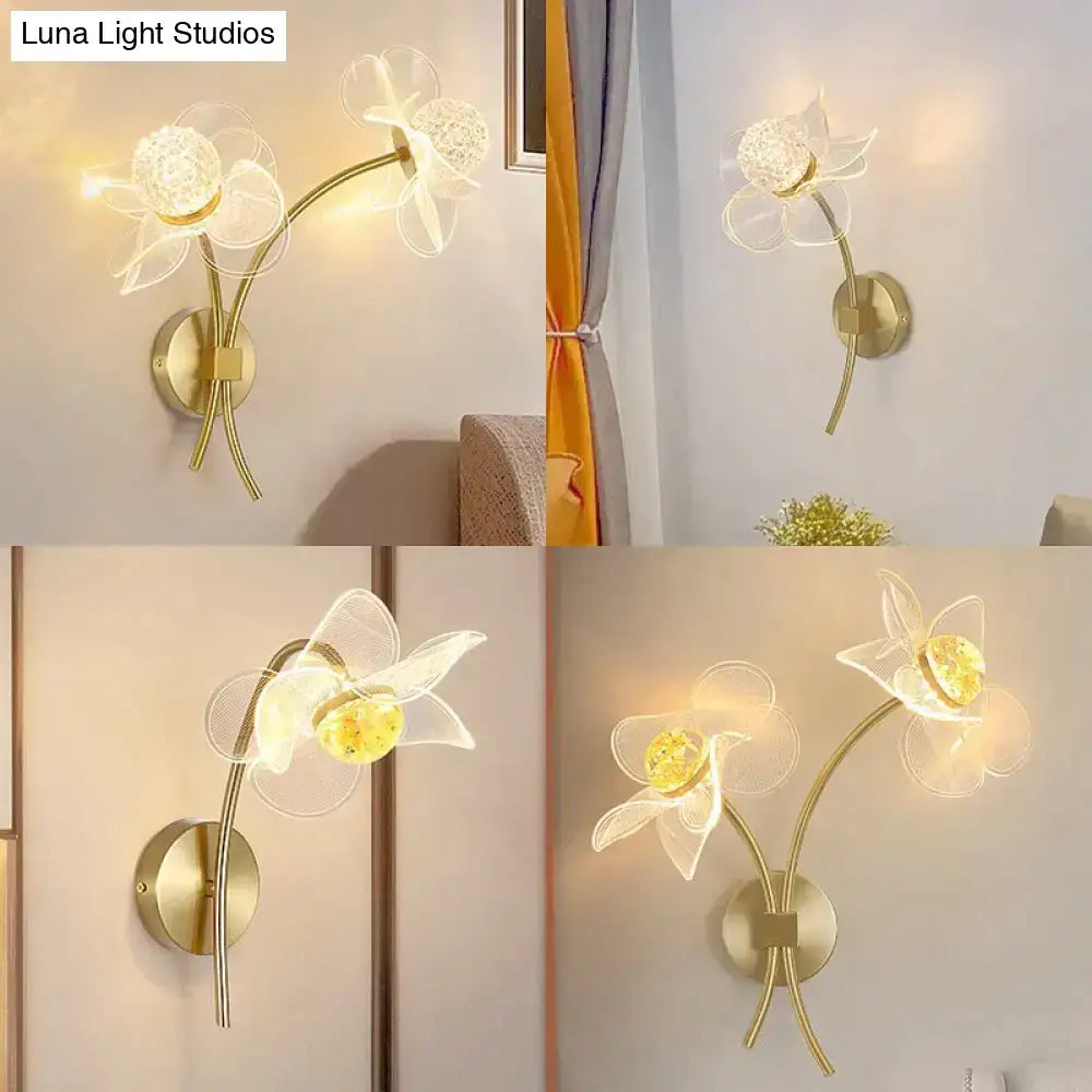 Creative floral decorative gold led wall lamp with delicate translucent flower designs and crystal centers for bedroom use