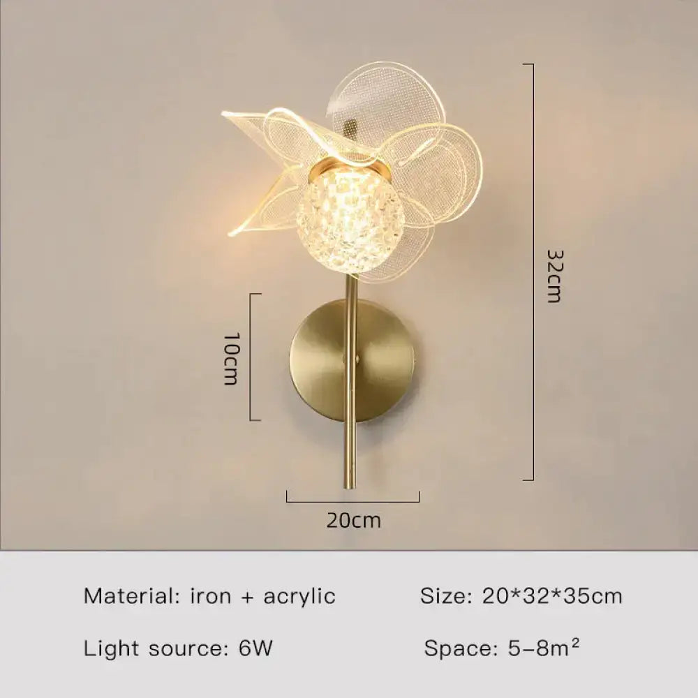 Creative floral decorative gold led wall sconce with a crystal globe and delicate mesh flower design for bedroom use