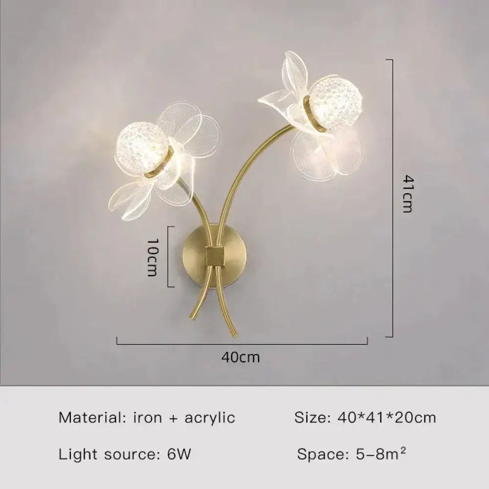 Creative floral decorative gold led wall lamp featuring two flower-shaped iron and acrylic lights with crystal centers