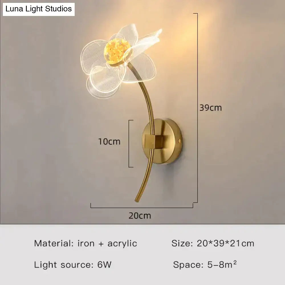 Creative floral decorative gold led wall lamp shaped like a flower with translucent acrylic petals and iron frame for bedroom