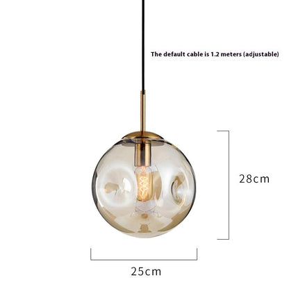 Gold and glass globe pendant light with black cord
