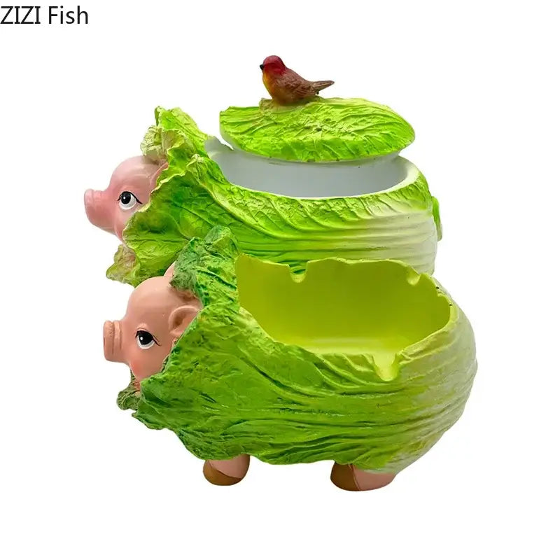 Whimsical two-tiered decorbites cabbage pig ashtray shaped like pink piglets in green cabbage leaves with red bird topper