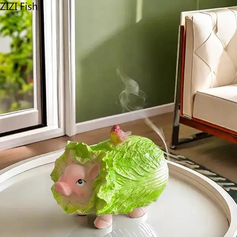 Pink ceramic decorbites cabbage pig ashtray with glossy finish, green cabbage leaves, and red bird for living room decor