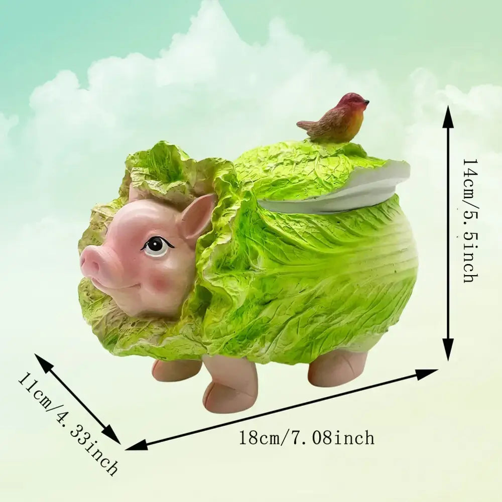 Cute pink pig figurine wrapped in textured green cabbage with small bird on top decorbites cabbage pig ashtray