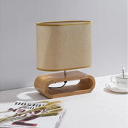 Beige linen lampshade with gold trim on a creative nordic wooden table lamp for bedroom decorbites creative nordic