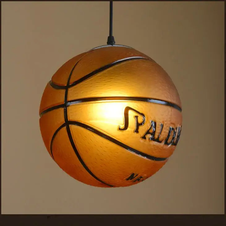 Creative orange basketball pendant light with warm glowing textured surface and black seams for bedroom decorbites basketball pendant