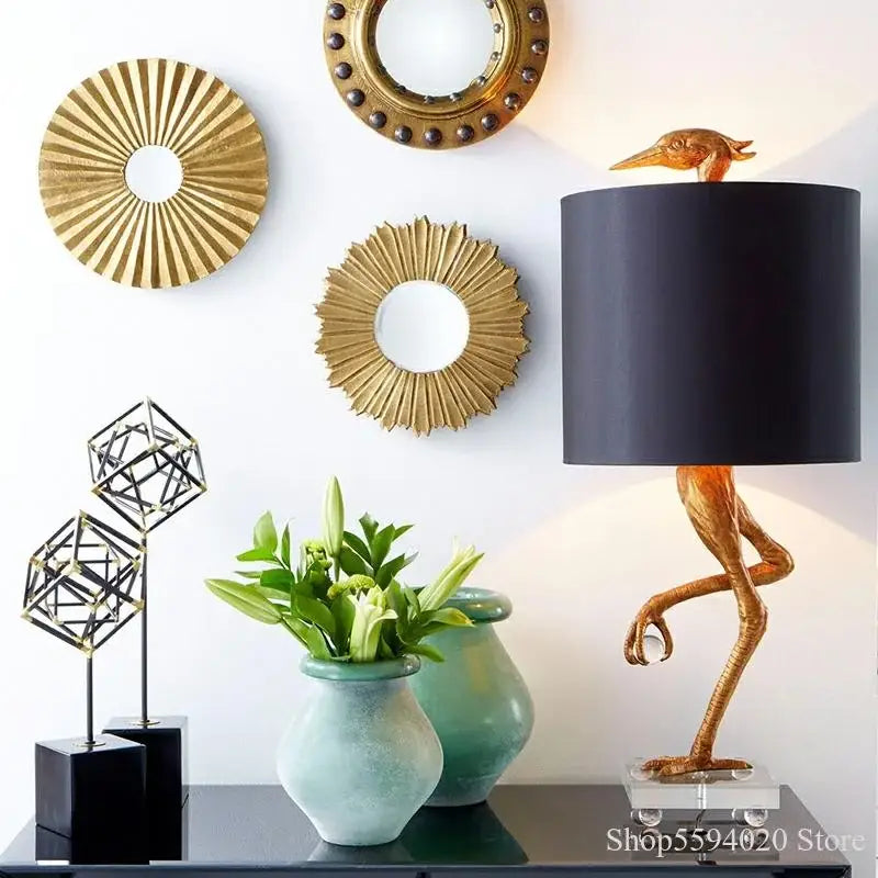 Golden bird-shaped table lamp with black shade and clear acrylic base by decorbites creative ostrich for bedroom decor