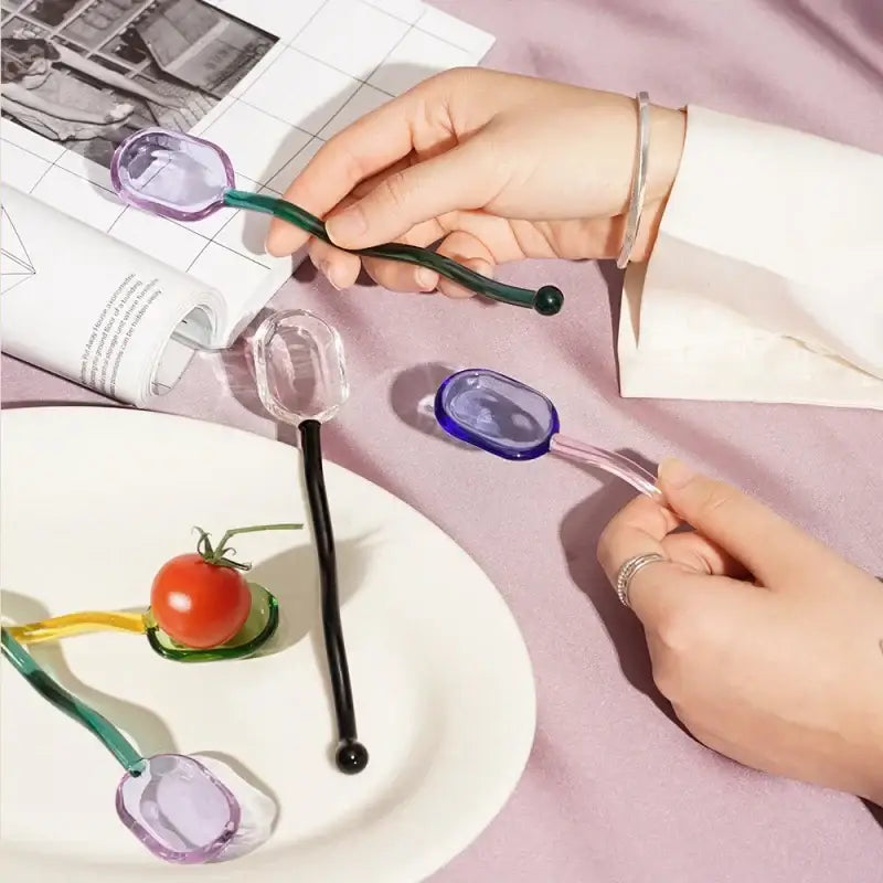 Creative purple and green glass spoon dessert set featuring colorful translucent heads for ice cream and coffee use