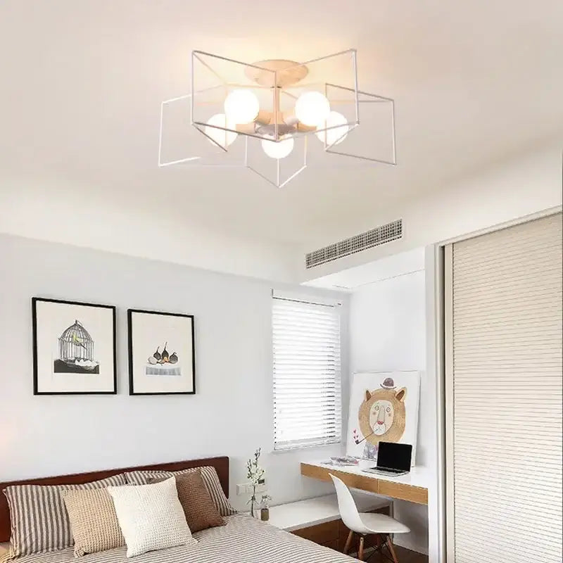 Modern geometric creative star led ceiling chandelier with a brushed gold frame and warm-toned acrylic decorbites creative star bulbs