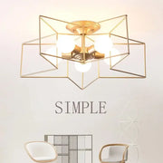 Gold-toned geometric ceiling chandelier with star-shaped frame and multiple spherical bulbs from decorbites creative star led collection