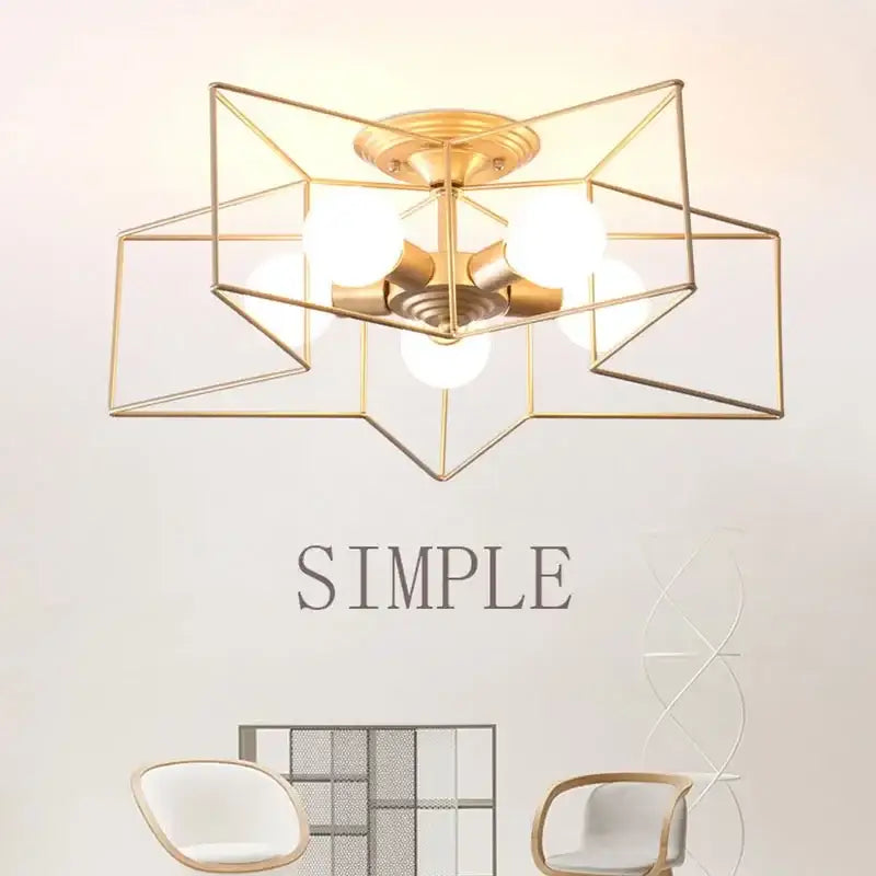 Gold-toned geometric ceiling chandelier with star-shaped frame and multiple spherical bulbs from decorbites creative star led collection