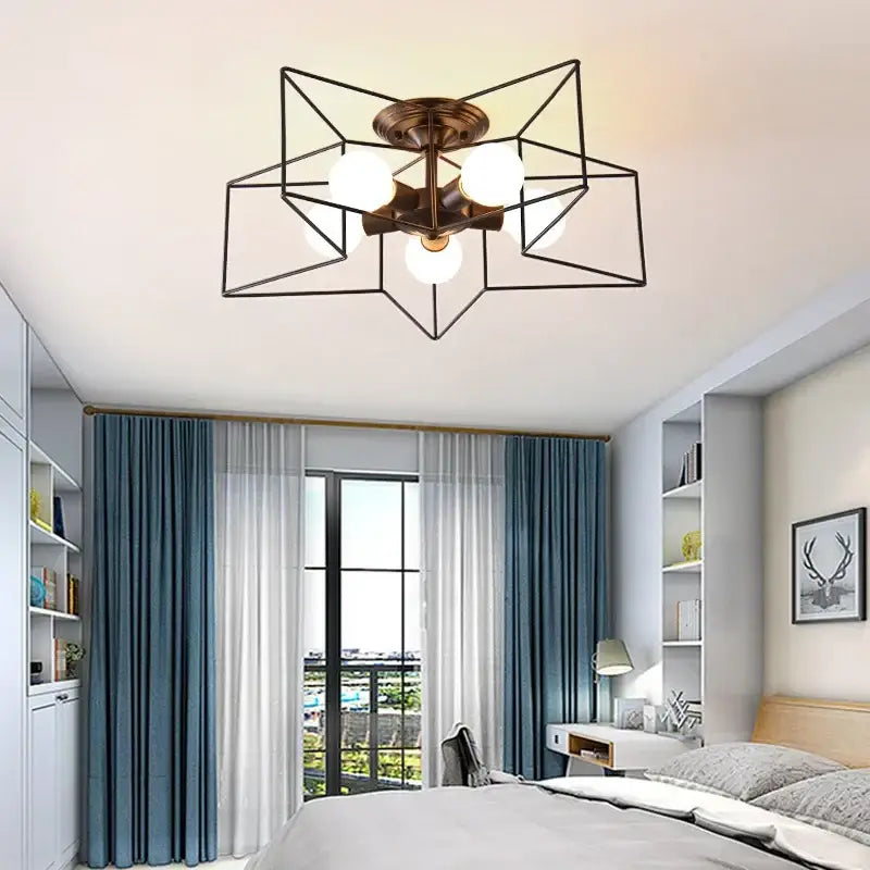 Black geometric star-shaped ceiling chandelier with four frosted glass bulbs and bronze-finished central fixture decorbites creative star led