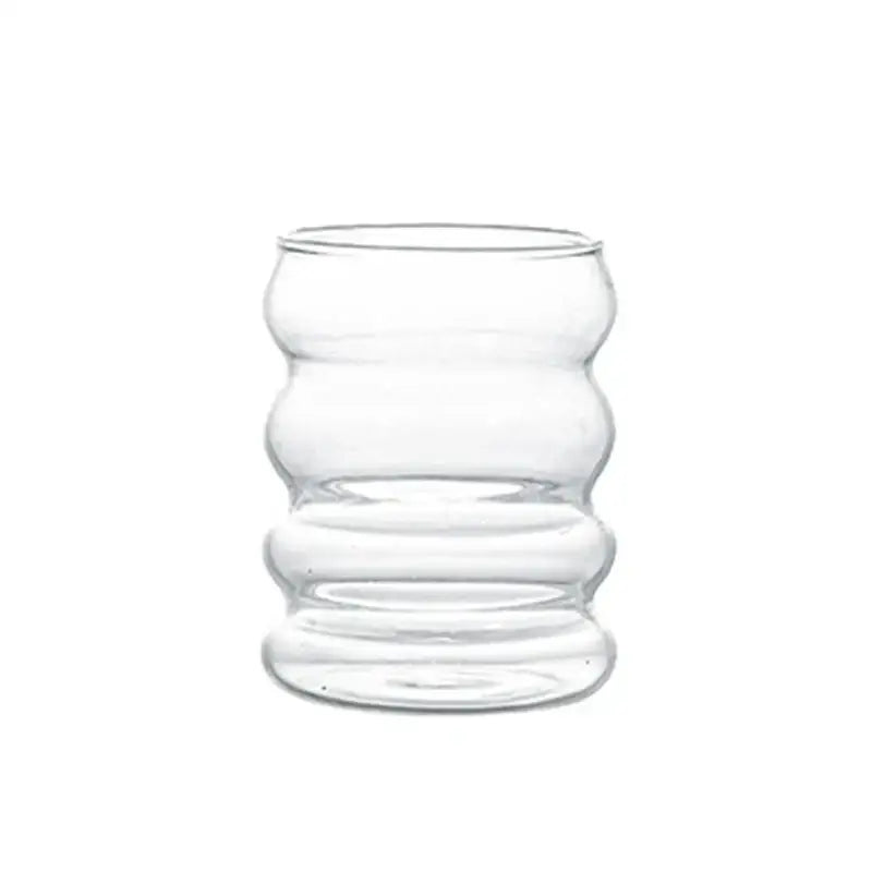 Clear glass tumbler with wavy segmented design for dining room by decorbites creative styling glass drinkware