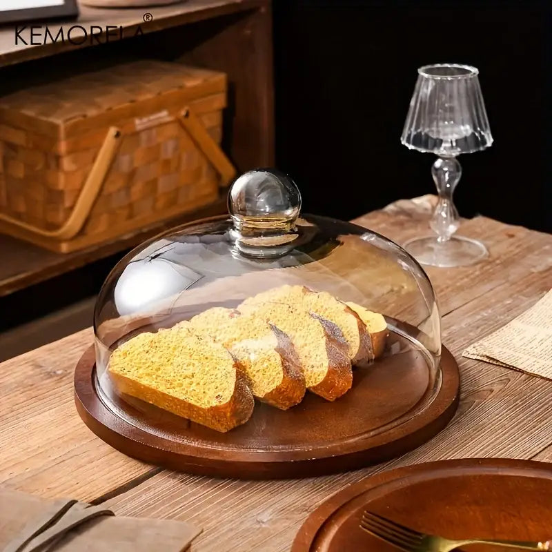Creative wooden cake storage box with clear glass lid and polished silver knob on a round wooden base by decorbites creative wooden