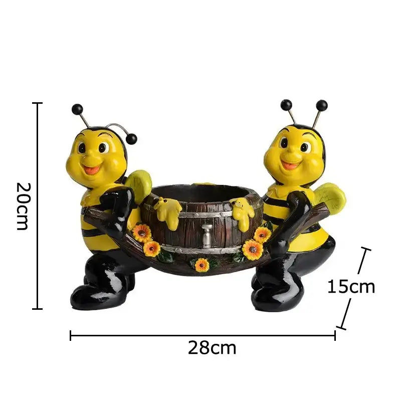 Creative yellow and black bee resin vase featuring figurines holding a wooden barrel planter with sunflowers