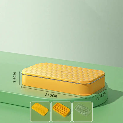 Bright yellow rectangular silicone ice mould tray with textured quilted top and rounded edges for kitchen drink cooler