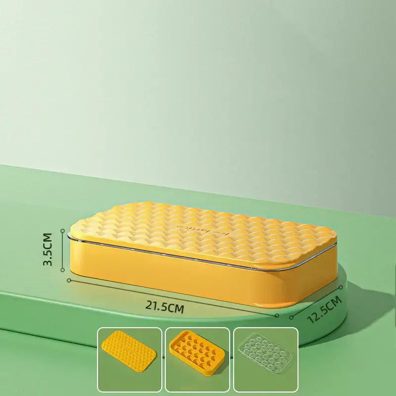 Bright yellow rectangular silicone ice mould tray with textured quilted top and rounded edges for kitchen drink cooler