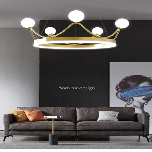 Crown design gold chandelier with five white spherical light bulbs for elegant living room decor by decorbites crown design