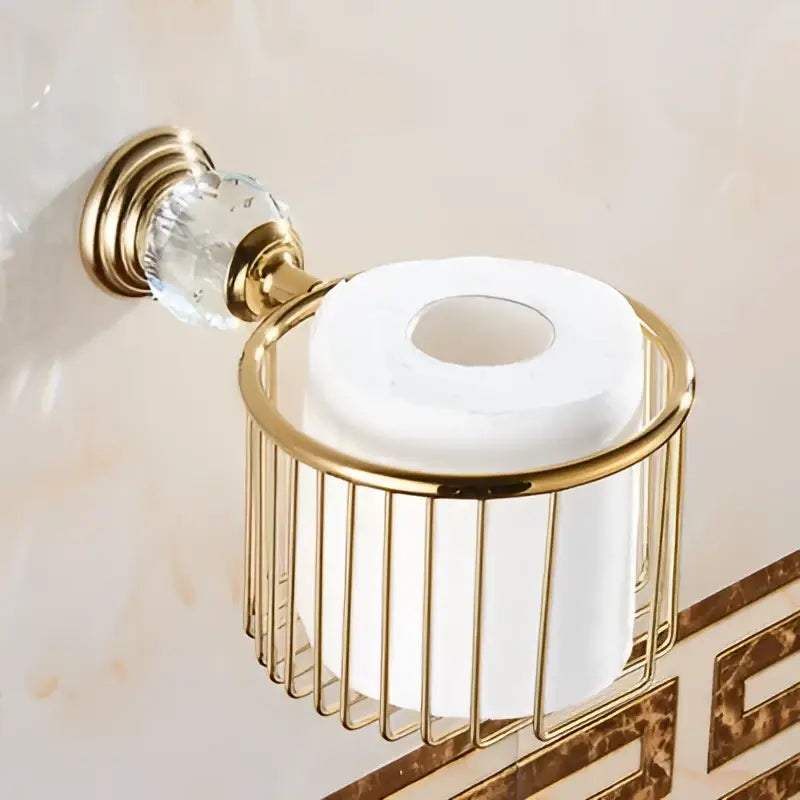 Gold-toned wire toilet paper holder with crystal knob in crystal bathroom accessories set by decorbites brass