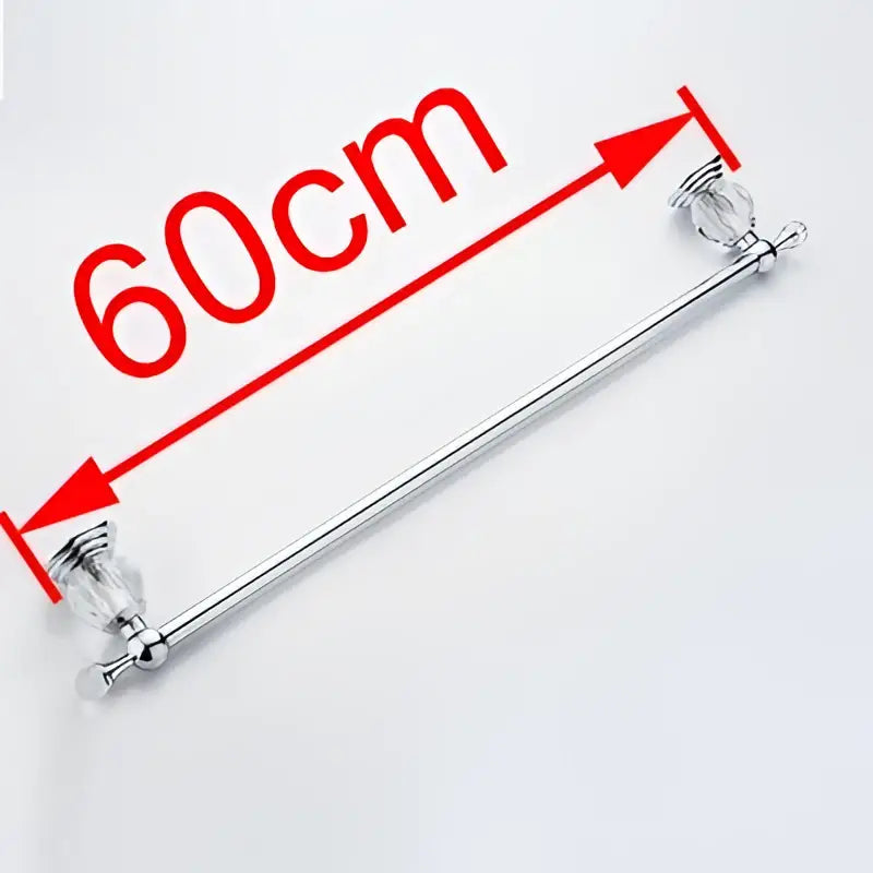 Chrome-finished bathroom towel bar with crystal-like faceted accent end caps from decorbites crystal chrome collection