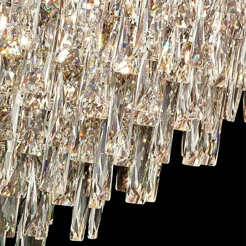 A decorbites crystal crown chandelier with cascading clear crystal prisms refracting rainbow light for living room decor