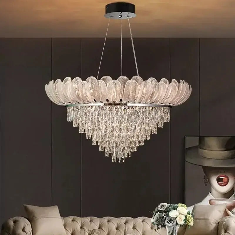 A decorbites crystal crown chandelier with circular translucent petal glass and clear crystal prism tiers for living room decor