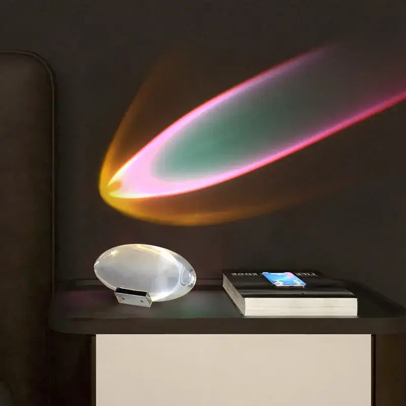 A decorbites crystal eye sky led table lamp in translucent white oval shape casting a vibrant rainbow light pattern