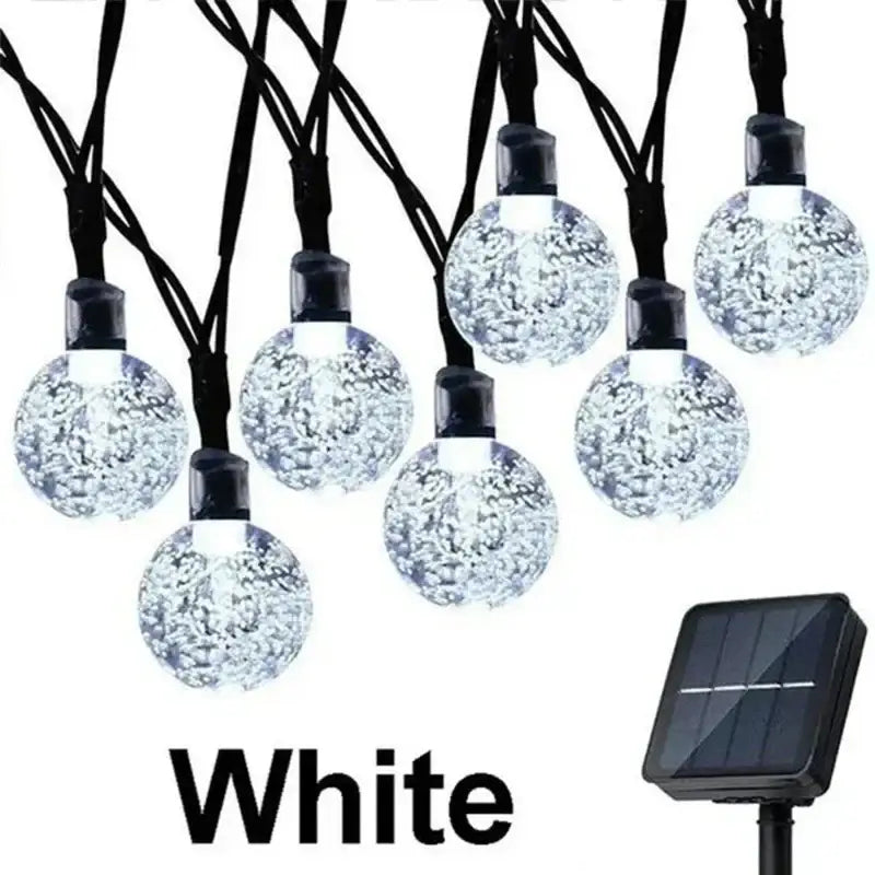 White spherical fairy solar string lights with sparkling bubble interior and black caps for decorbites crystal fairy patio decor