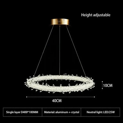 A modern crystal flower led ring chandelier with gold-toned ceiling mount and clear crystal accents for dining room lighting