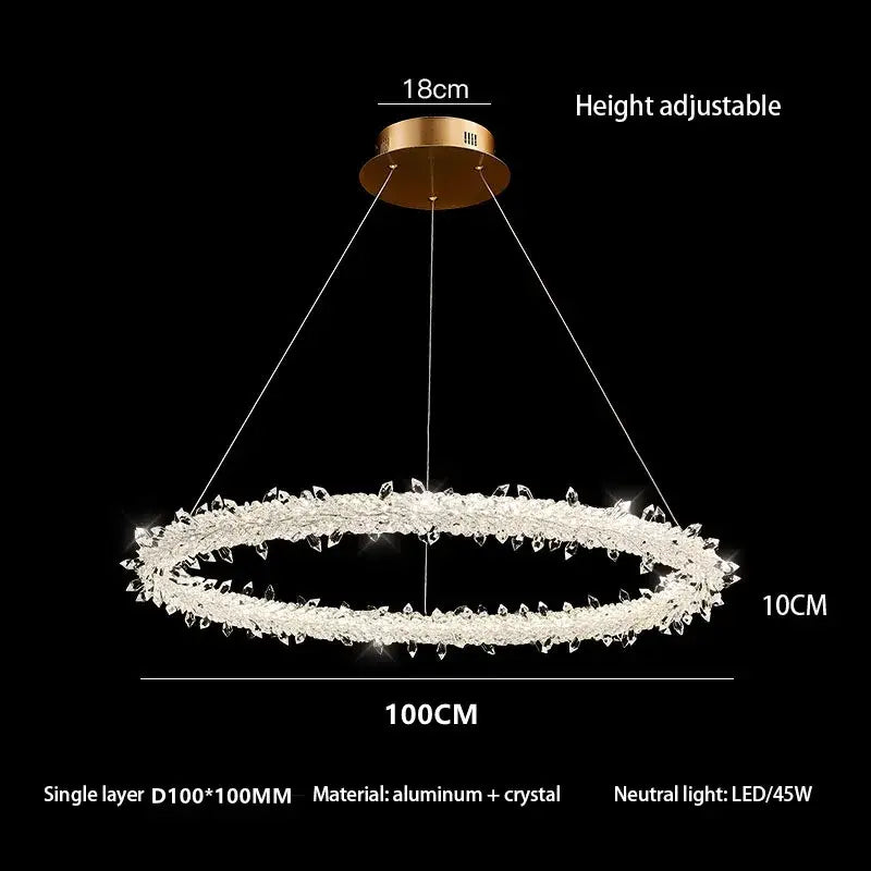 A modern crystal flower led ring chandelier with gold-toned mount and clear crystals for dining room lighting