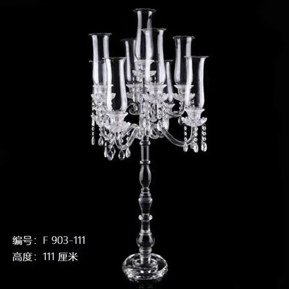Clear crystal glass candle holders with multiple slender arms and teardrop accents for elegant dining room decorbites decor