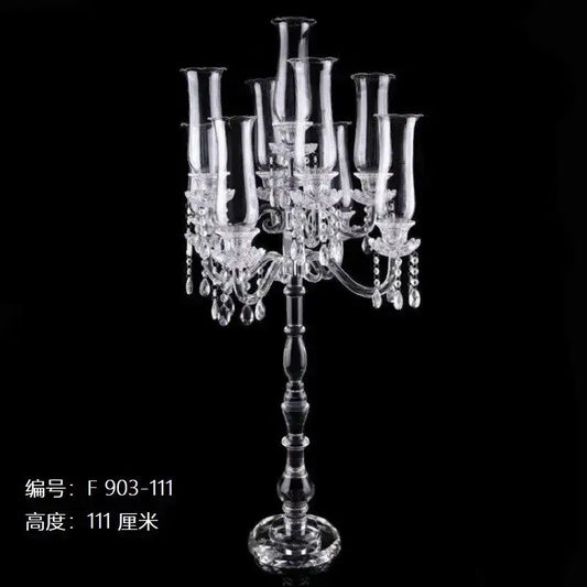 Clear crystal glass candle holders with multiple slender arms and teardrop accents for elegant dining room decorbites decor
