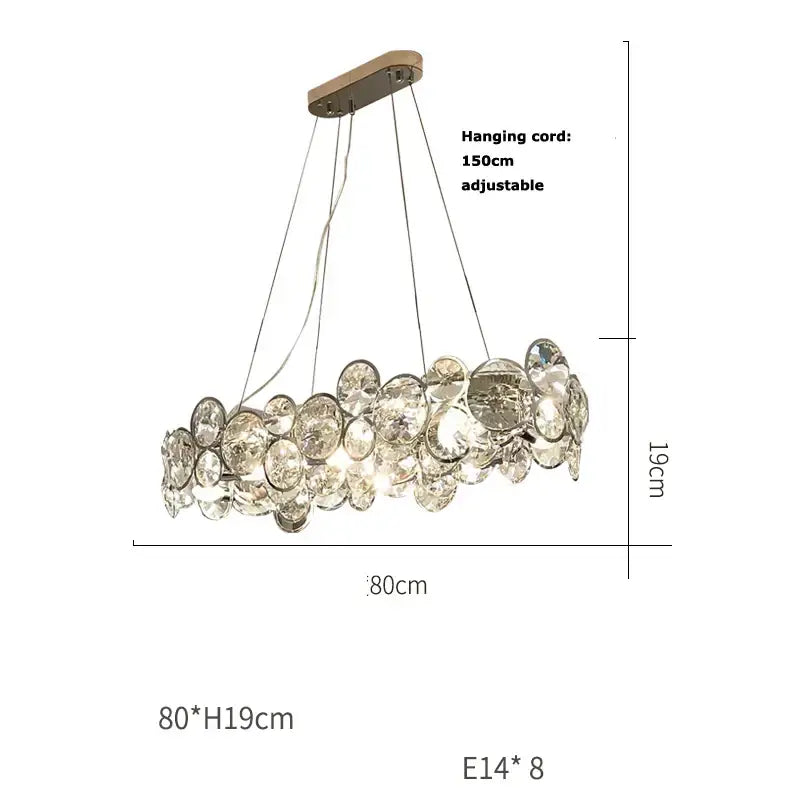 A modern decorbites crystal magic ring pendant light with clear faceted crystal discs and adjustable metallic frame