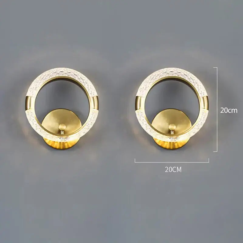Gold-toned crystal nordic wall sconce with textured crystal outer ring and smooth inner circle for bedroom decorbites decor