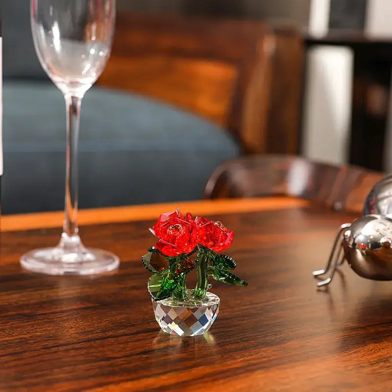 A sparkling red crystal rose flower dreams glass paperweight bouquet in a faceted clear glass vase for bedroom decor