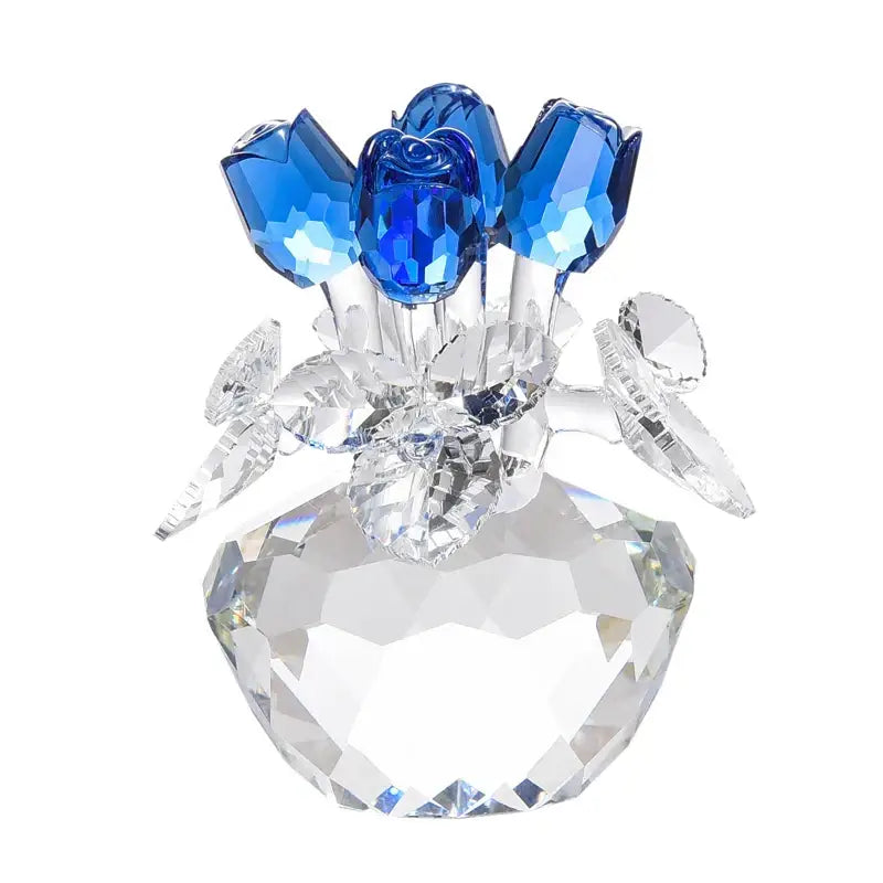 A sparkling blue crystal tulip glass paperweight bouquet in a clear faceted vase for rose flower dreams decor