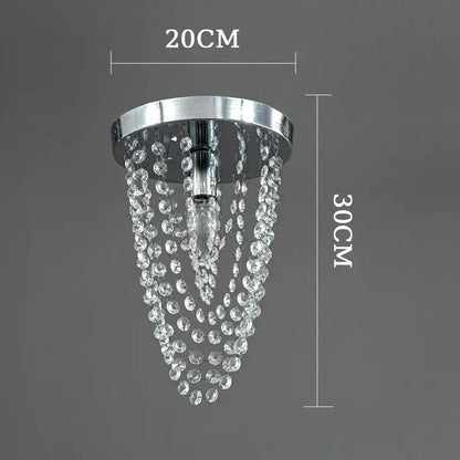 A sleek chrome ceiling light decorbites crystal sun flower with cascading clear faceted crystal beads for bedroom decor