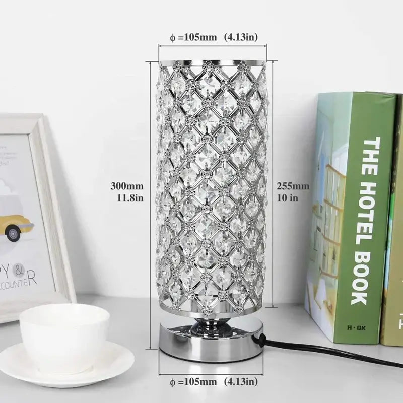 A tall crystal touch bedside lamp with chrome lattice metal base for elegant bedroom decorbites lighting