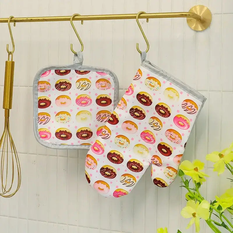 White cotton kitchen baking gloves and pot holder set with playful donut pattern and gray trim for decorbites cotton kitchen use
