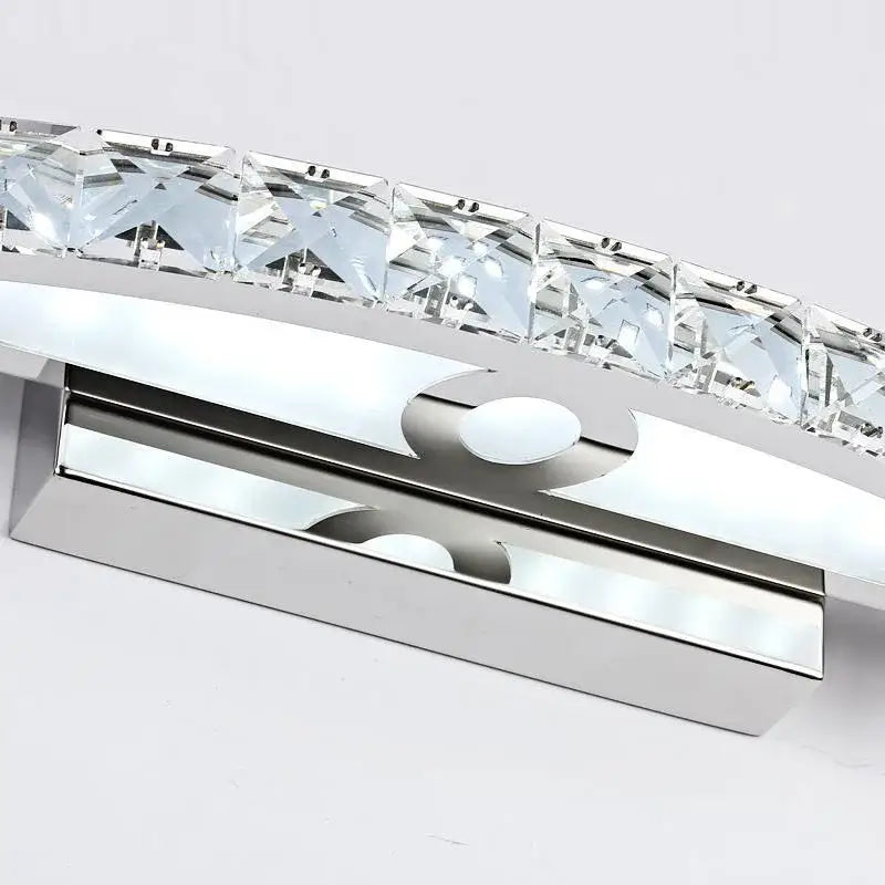 Curved chrome amber crystal bathroom wall sconce with modern chrome finish and faceted crystal squares wall sconce